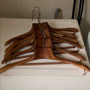 Six vintage wooden suit hangers